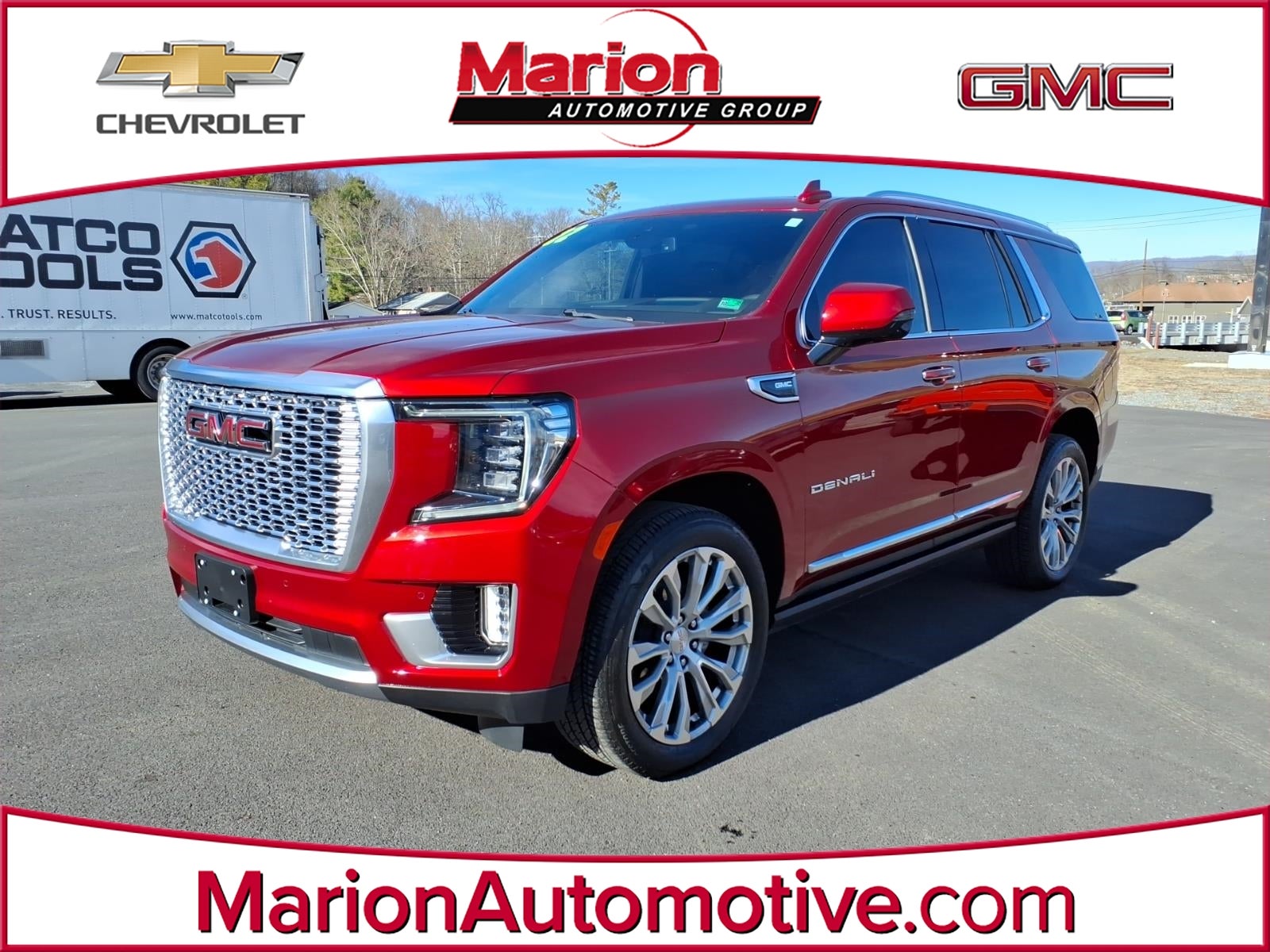 2022 GMC Yukon Denali in Cayenne Red Tintcoat — front three-quarter view